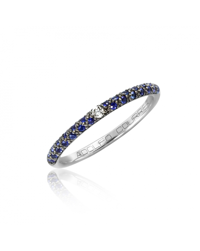 Blue sapphire and central white diamond wedding ring...